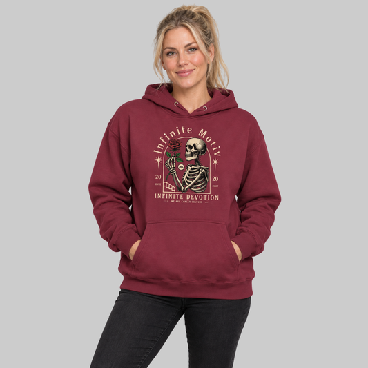 Infinite Devotion hoodie in maroon, worn by a model