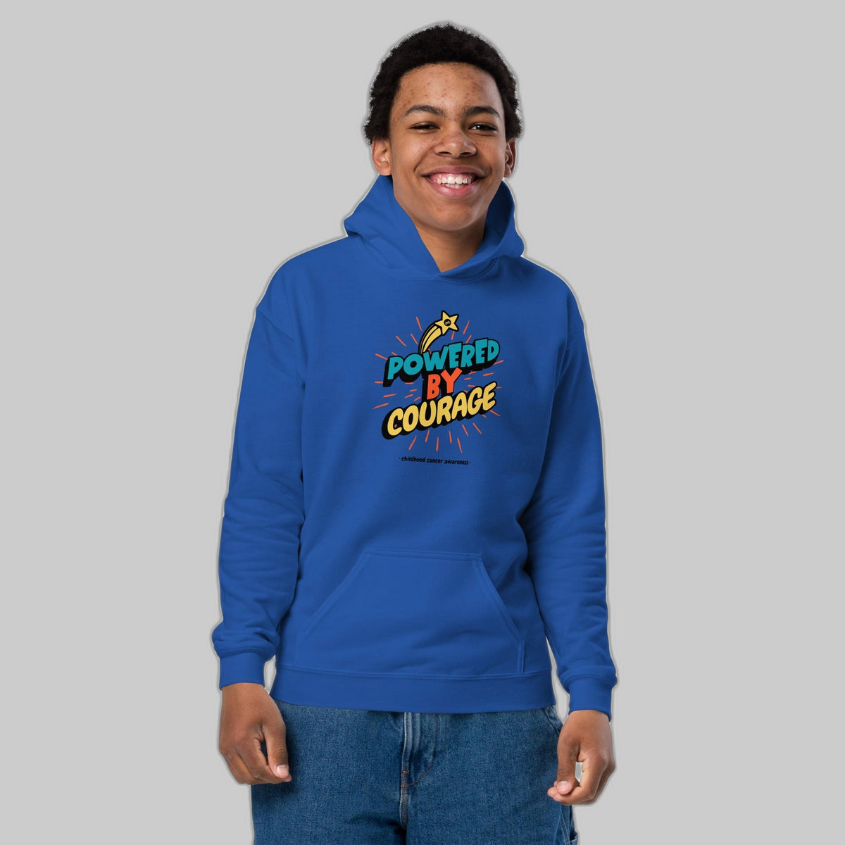 Powered by Courage youth pullover hoodie in Royal, front view, gold shooting-star graphic. Childhood cancer gold ribbon kids apparel from CancerCulture®