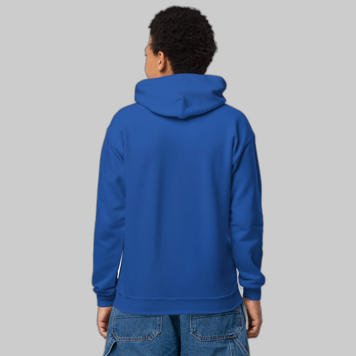 Powered by Courage youth pullover hoodie in Royal, back view (plain back, print is on the front). Childhood cancer gold ribbon kids apparel from CancerCulture®