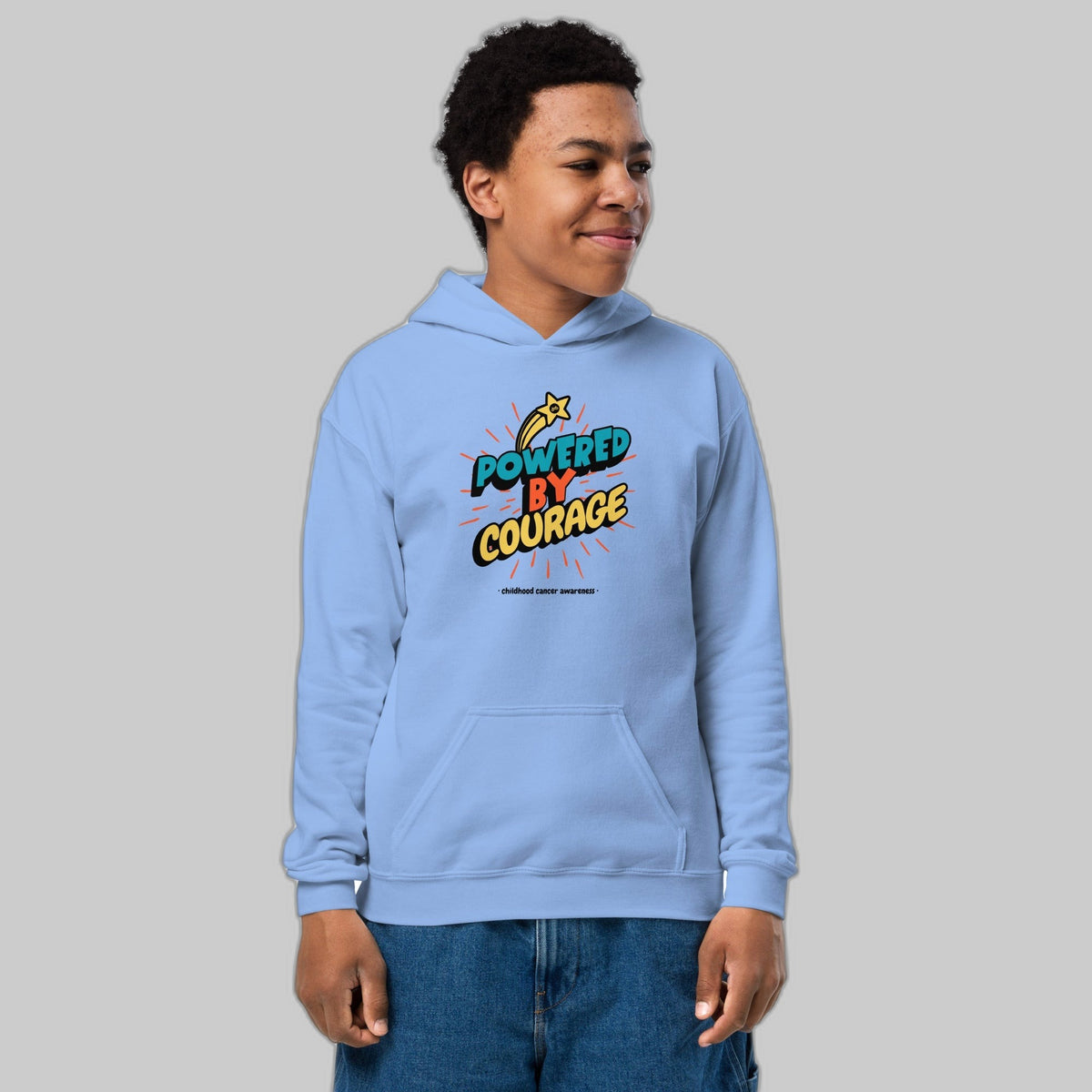 Powered by Courage youth pullover hoodie in Carolina Blue, front view, gold shooting-star graphic. Childhood cancer gold ribbon kids apparel from CancerCulture®