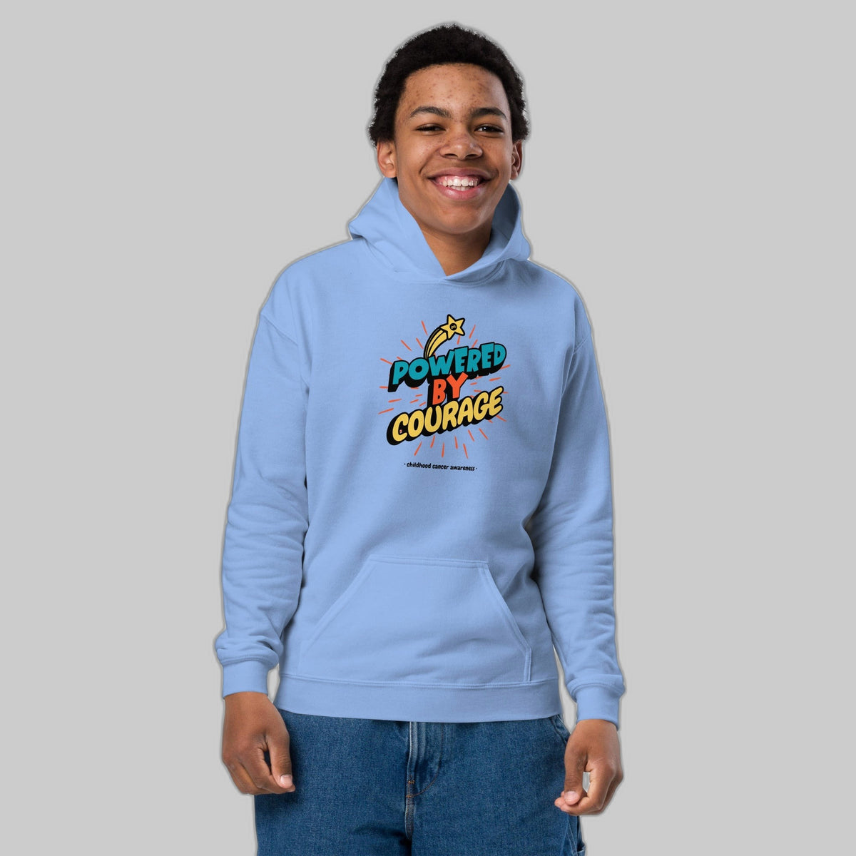 Powered by Courage youth pullover hoodie in Carolina Blue, front view, gold shooting-star graphic. Childhood cancer gold ribbon kids apparel from CancerCulture®