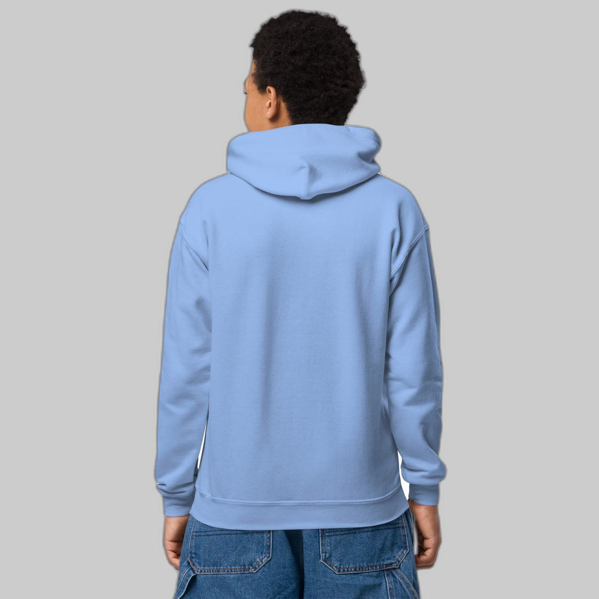 Powered by Courage youth pullover hoodie in Carolina Blue, back view (plain back, print is on the front). Childhood cancer gold ribbon kids apparel from CancerCulture®